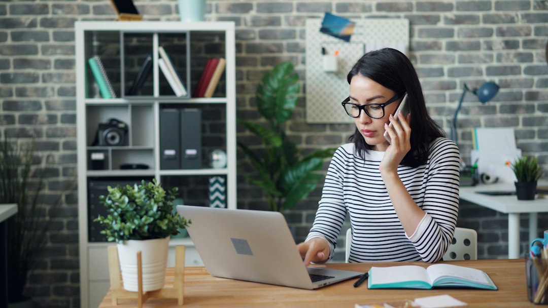 A busy business owner working late at her desk