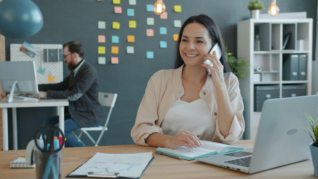 A business owner on a friendly call with a customer